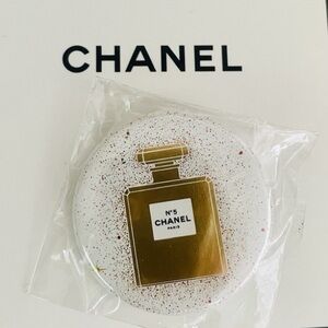 Chanel brooch gift from 2023 holiday collection New Chanel No. 5 Perfume Pin
